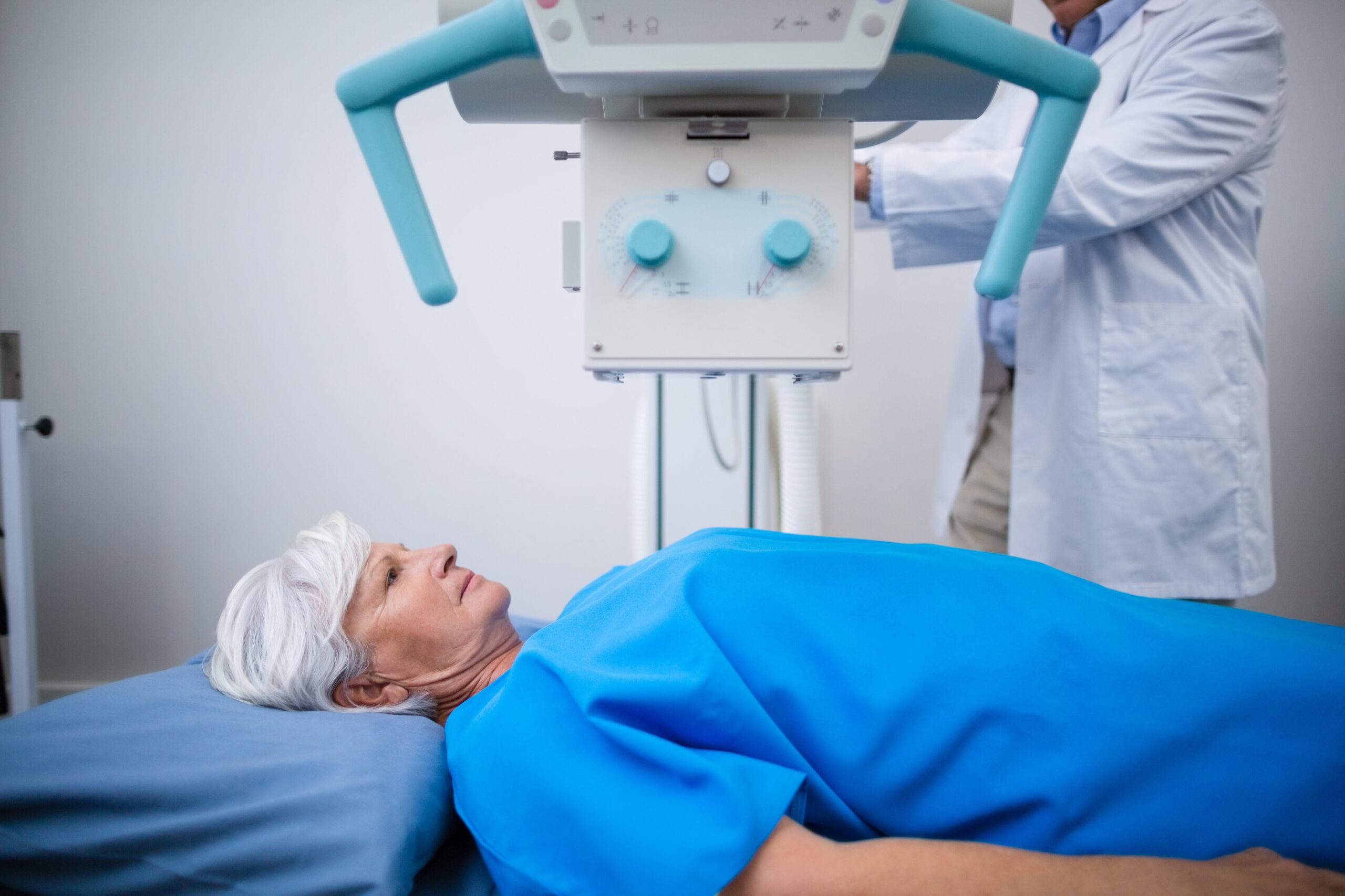 senior-woman-undergoing-an-x-ray-test-min